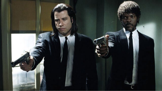 John Travolta y Samuel L. Jackson en su icónica interpretación de Vincent Vega y Jules Winnfield