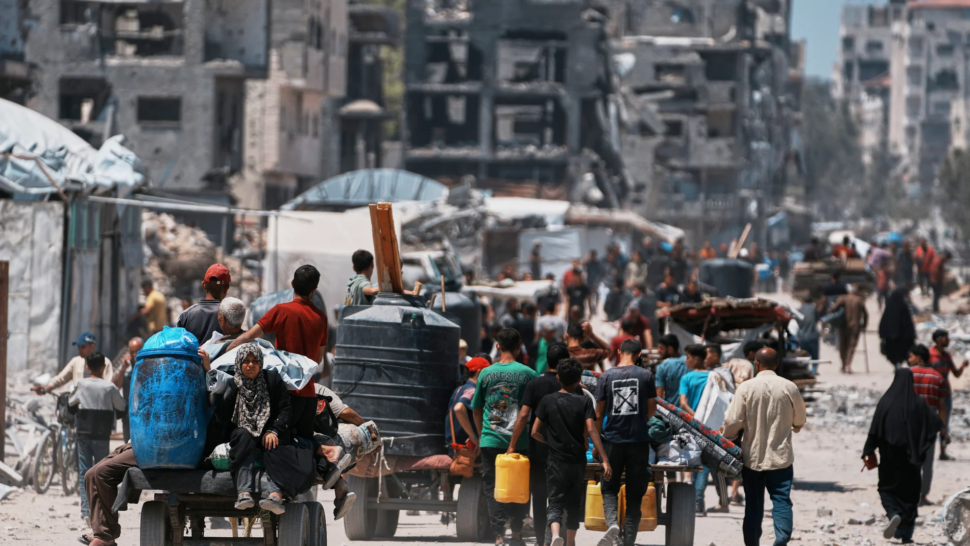 Displaced Palestinians return to retrieve their belongings from their homes in the area where the Israeli army operated in the northern Gaza Strip on Wednesday, June 4, 2025. (AP Photo/Jehad Alshrafi)