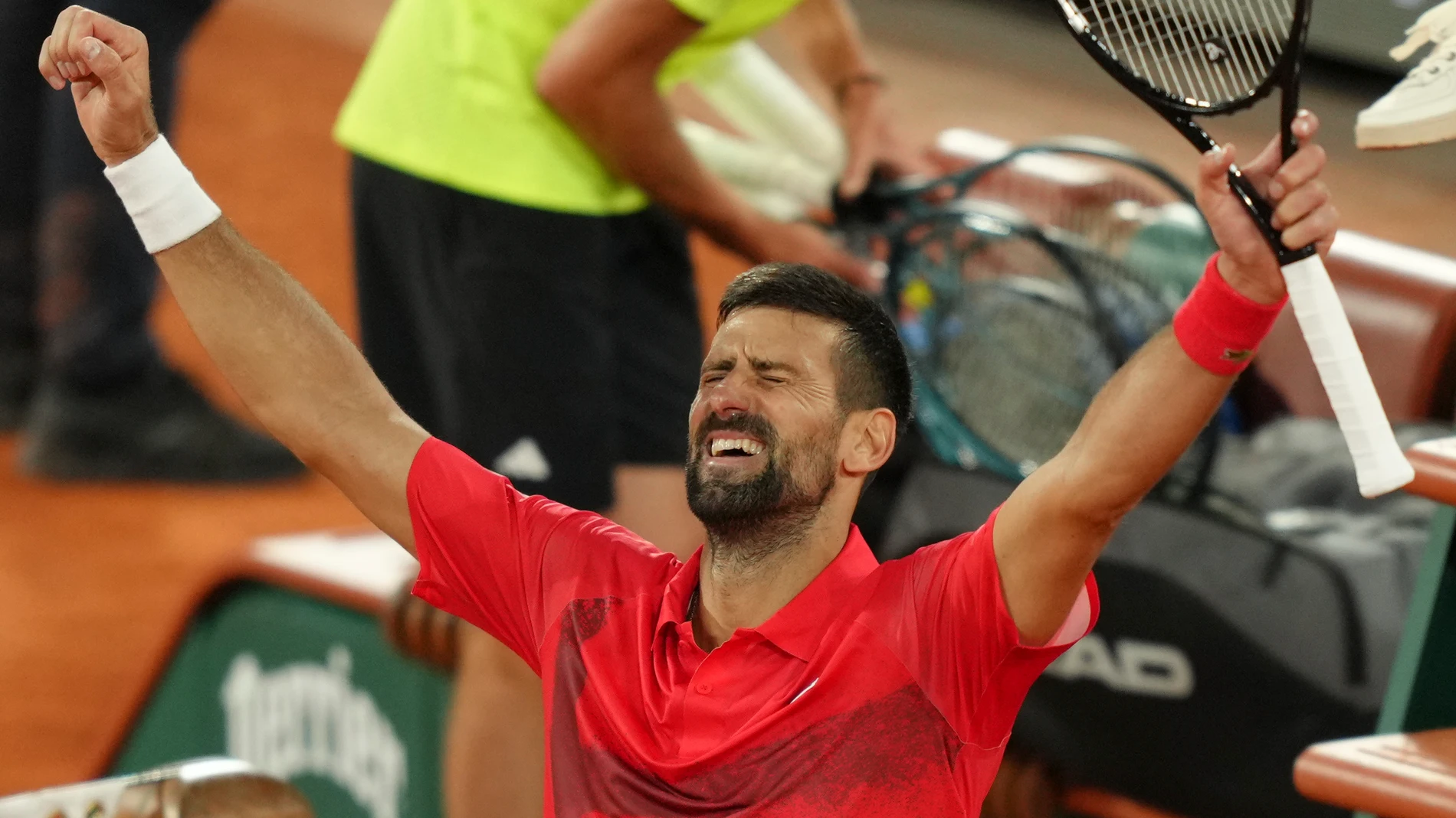 Serbia's Novak Djokovic celebrates as he won the quarterfinal match of the French Tennis Open against Germany's Alexander Zverev at the Roland-Garros stadium in Paris, Wednesday, June 4, 2025. (AP Photo/Aurelien Morissard)