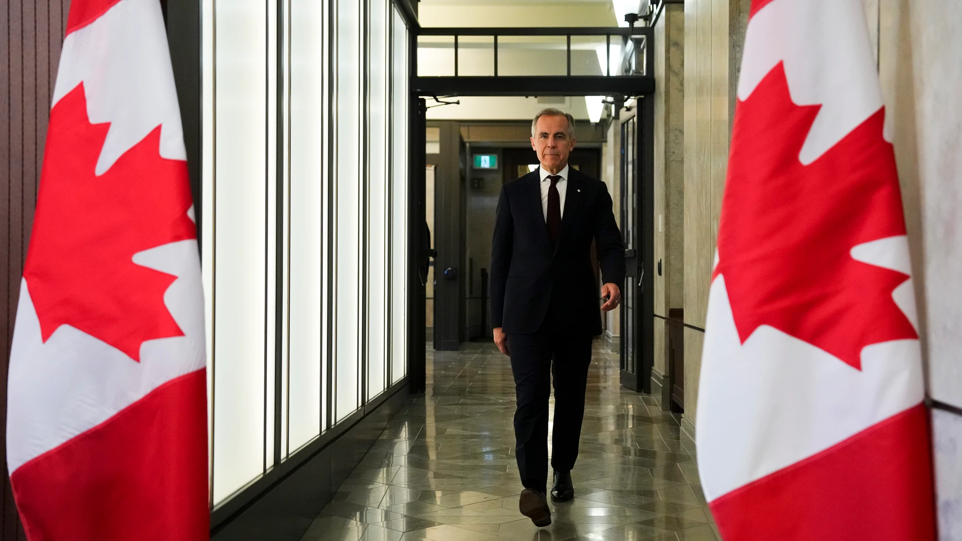 Prime Minister Mark Carney arrives to hold a press conference on Parliament Hill in Ottawa on Friday, June 6, 2025. (Sean Kilpatrick /The Canadian Press via AP)