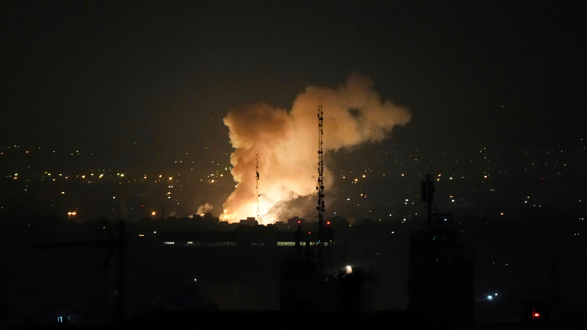 Smoke rises up after an explosion in Tehran, Iran, Friday, June 13, 2025. (AP Photo/Vahid Salemi)