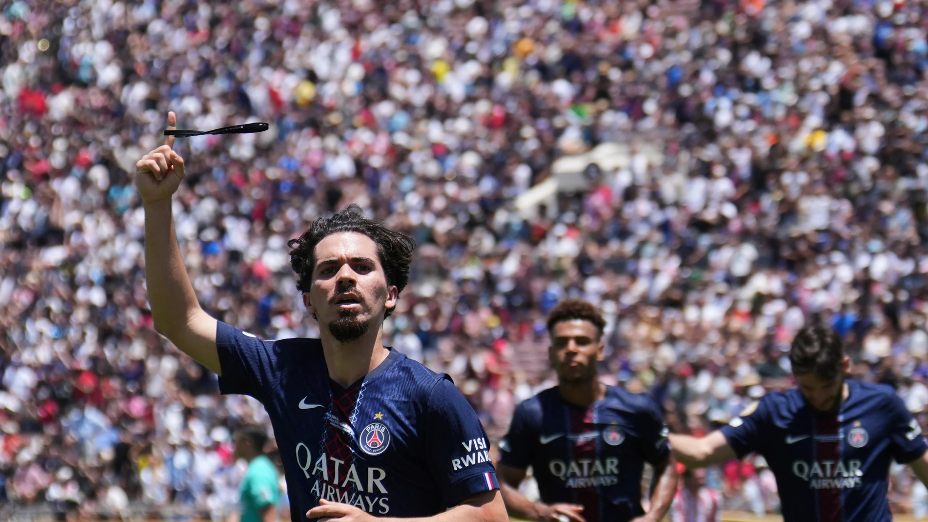 Paris Saint-Germain's Vitinha celebrates scoring his side's second goal during the Club World Cup group B soccer match between PSG and Atletico Madrid in Pasadena, Calif., Sunday, June 15, 2025. (AP Photo/Jae Hong)