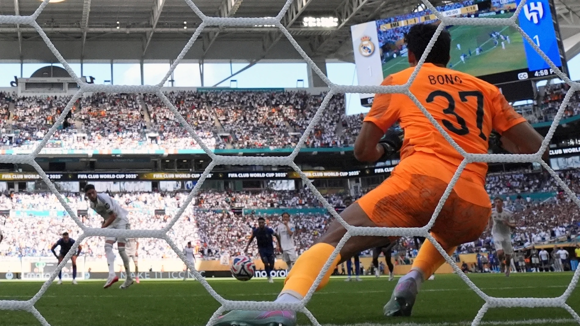 Al-Hilal's Yassine Bounou blocks the penalty shot of Real Madrid's Arda Guler during the Club World Cup group H soccer match between Real Madrid and Al Hilal in Miami Gardens, Fla., Wednesday, June 18, 2024. (AP Photo/Rebecca Blackwell)