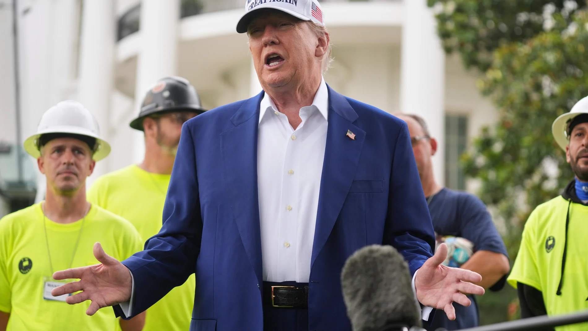 President Donald Trump speaks as a flag pole is installed on the South Lawn of the White House, Wednesday, June 18, 2025, in Washington. (AP Photo/Evan Vucci)