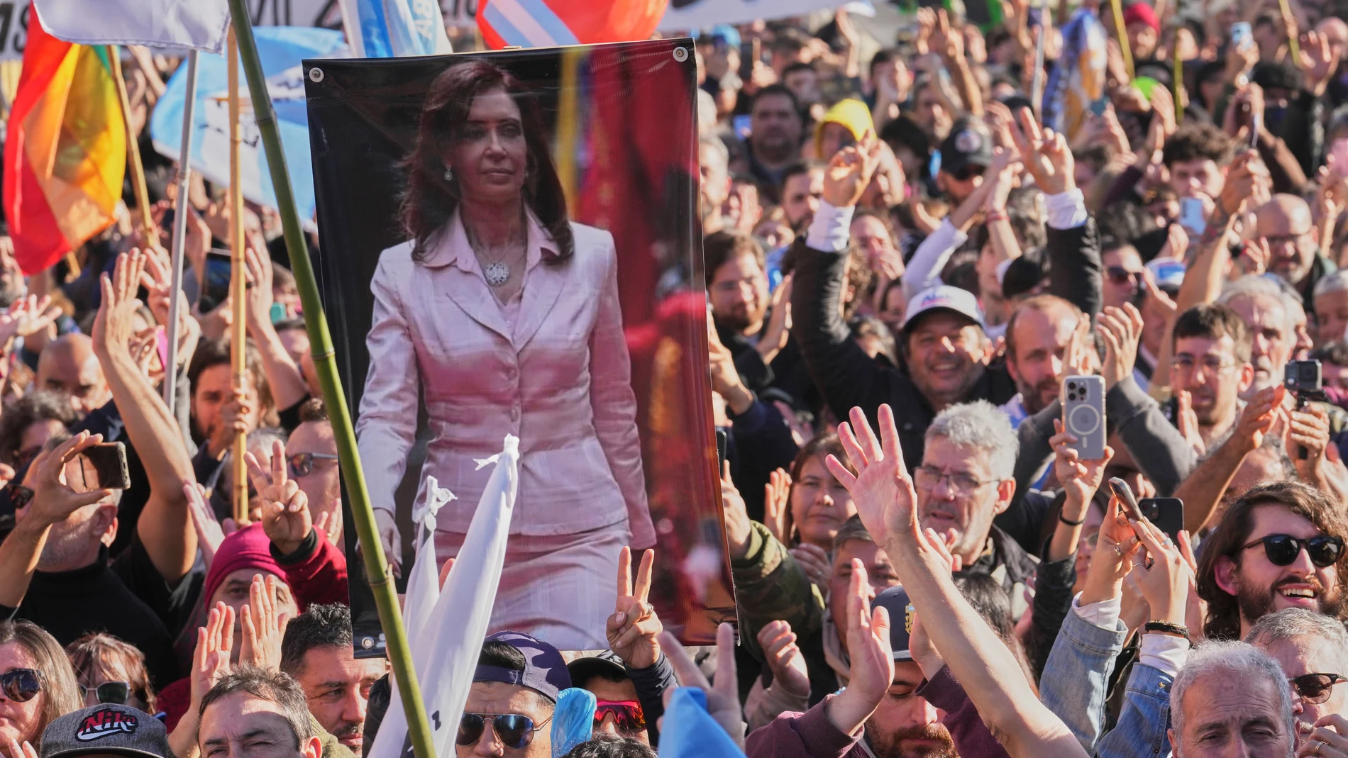 Supporters of Argentina's former President Cristina Fernandez protest in her defense in Plaza de Mayo after she began serving a six-year prison sentence under house arrest for corruption in Buenos Aires, Argentina, Wednesday, June 18, 2025. (AP Photo/Gustavo Garello)