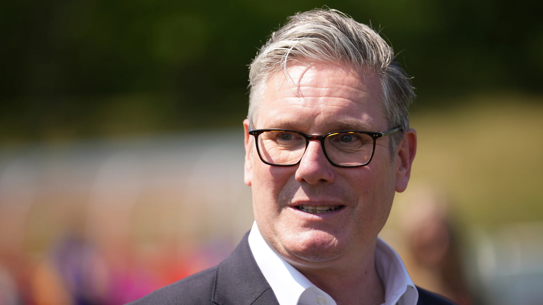 Britain's Prime Minister Keir Starmer looks on as he meets with the England Women's football team, the Lionesses, at St George's Park in Staffordshire, England, Thursday June 19, 2025. (Christopher Furlong/Pool Photo via AP)
