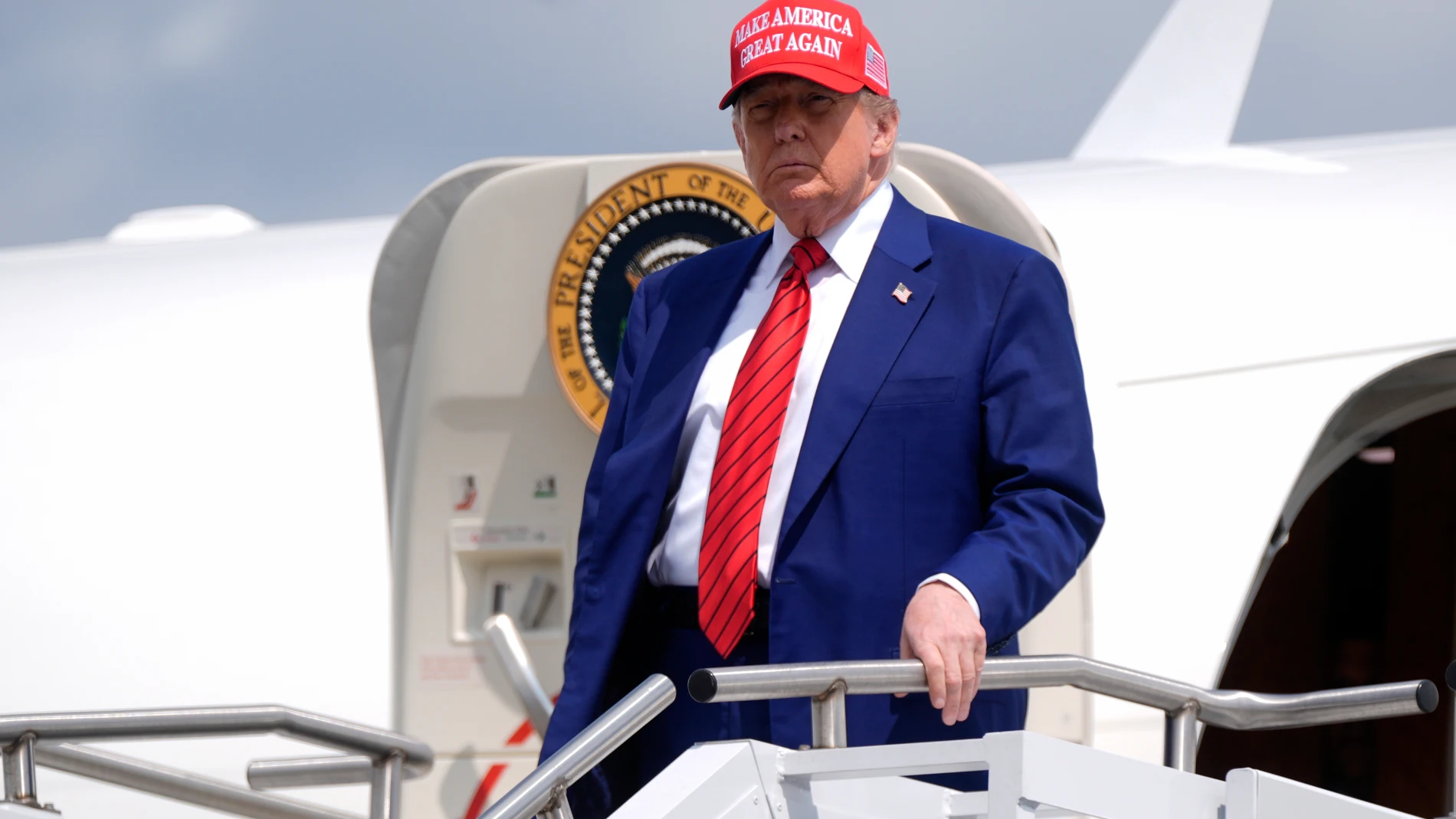 President Donald Trump arrives on Air Force One at Morristown Municipal Airport in Morristown, N.J., Friday, June 20, 2025. (AP Photo/Manuel Balce Ceneta)