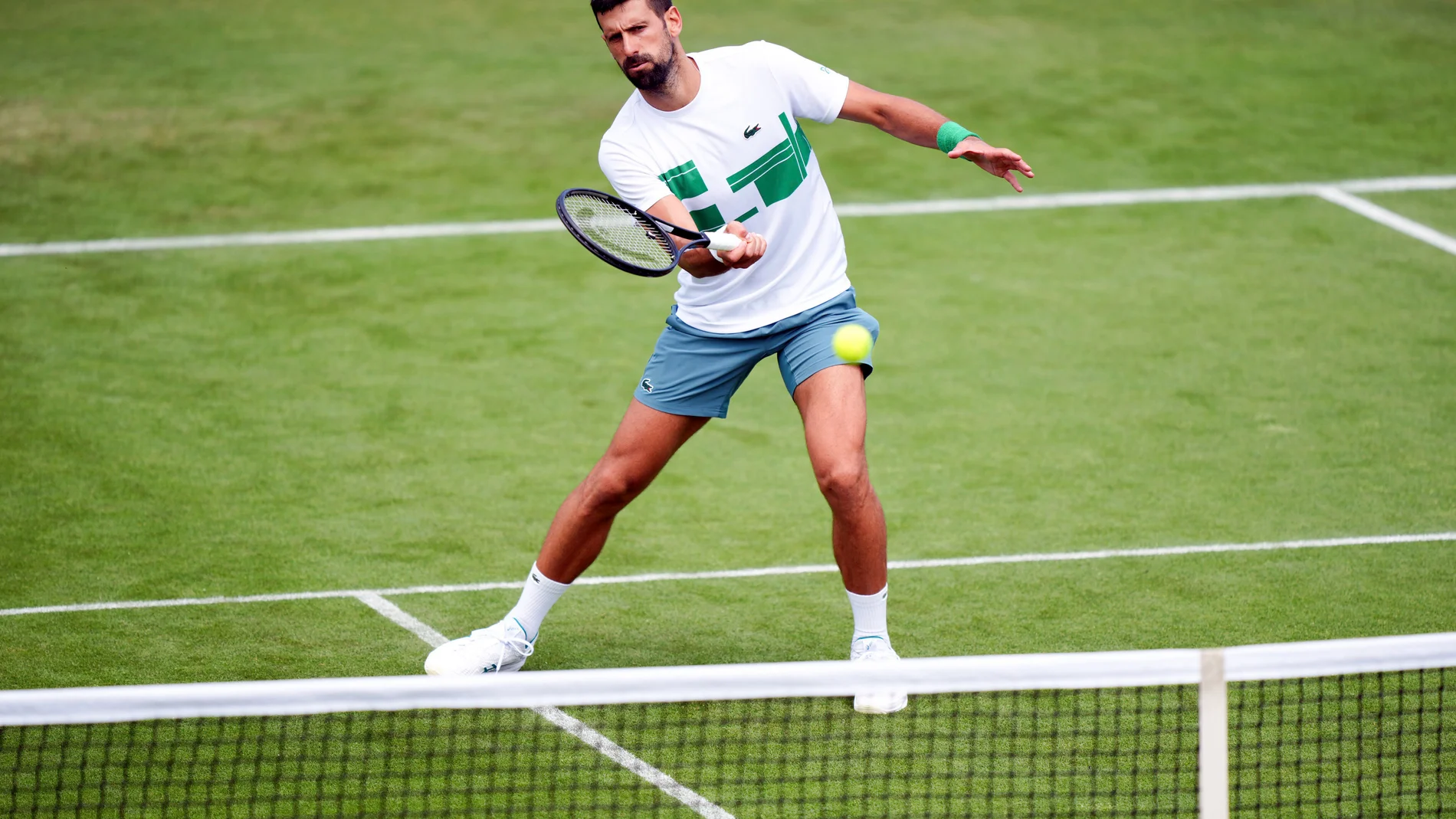 Novak Djokovic during a practice session at the All England Lawn Tennis and Croquet Club, ahead of the Wimbledon Championships, England, Tuesday June 24, 2025. (Ben Whitley/PA via AP)