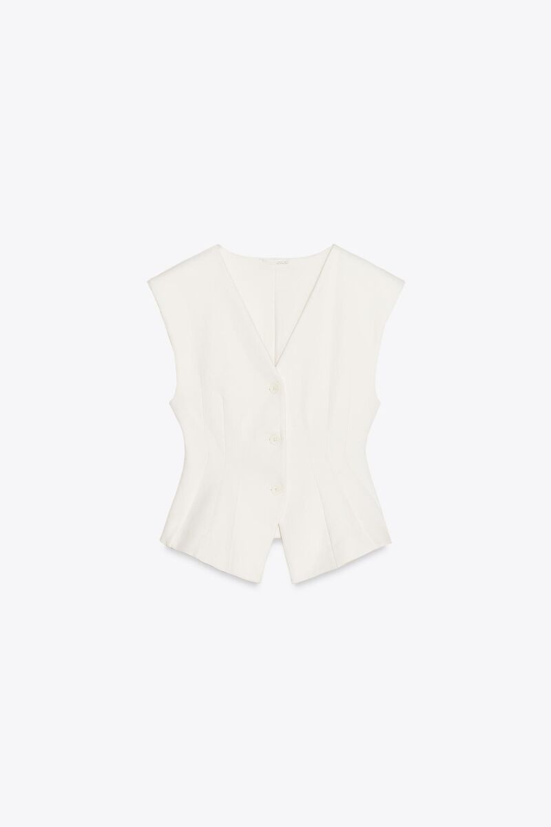 Top chaleco interlock.