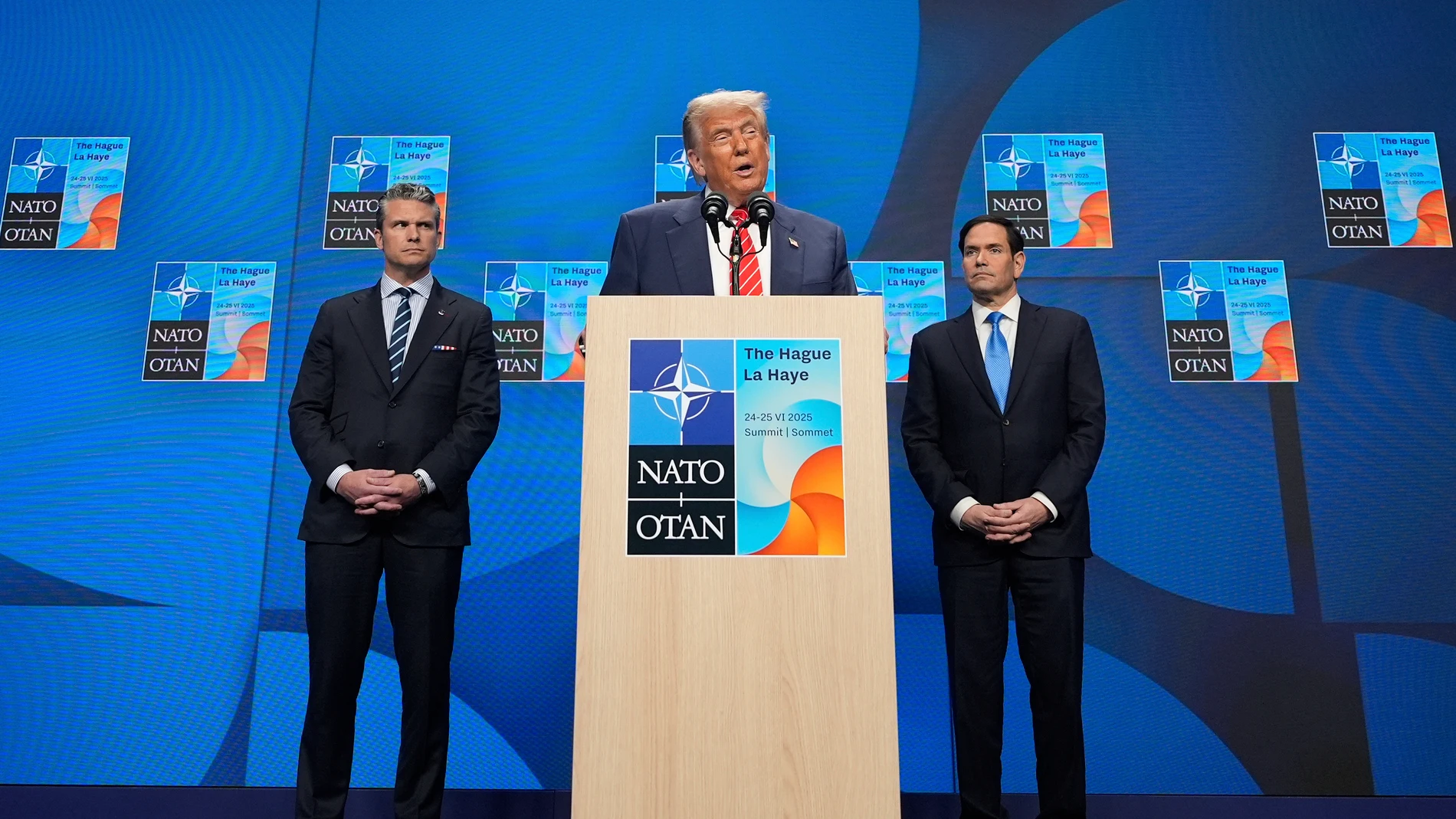 President Donald Trump speaks during a media conference at the end of the NATO summit as Foreign Secretary Marco Rubio, right, and Defence Secretary Pete Hegseth listen, in The Hague, Netherlands, Wednesday, June 25, 2025. (AP Photo/Alex Brandon)