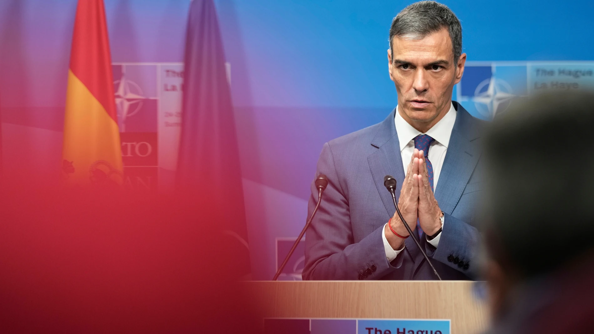 Spain's Prime Minister Pedro Sanchez gestures during a press conference after the plenary session at the NATO summit in The Hague, Netherlands, Wednesday, June 25, 2025. (AP Photo/Markus Schreiber)