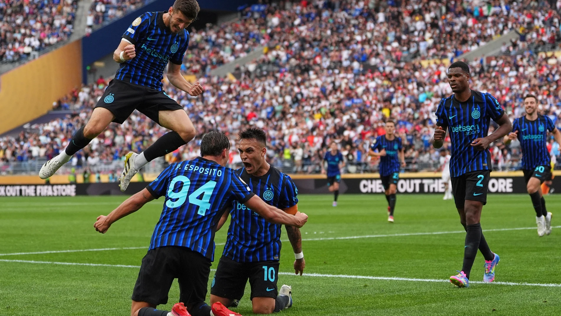 Inter Milan's Francesco Pio Esposito (94) celebrates with teammates, including Petar Sucic, left, Lautaro Martinez (10) and Denzel Dumfries (2) after scoring the game's first goal during the Club World Cup Group E soccer match between Inter Milan and River Plate in Seattle, Wednesday, June 25, 2025. (AP Photo/Lindsey Wasson)