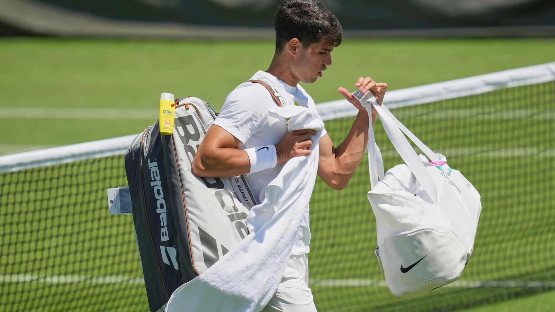Carlos Alcaraz of Spain attends a practice session ahead of the Wimbledon Championships in London, Friday, June 27, 2025. (AP Photo/Kin Cheung)
