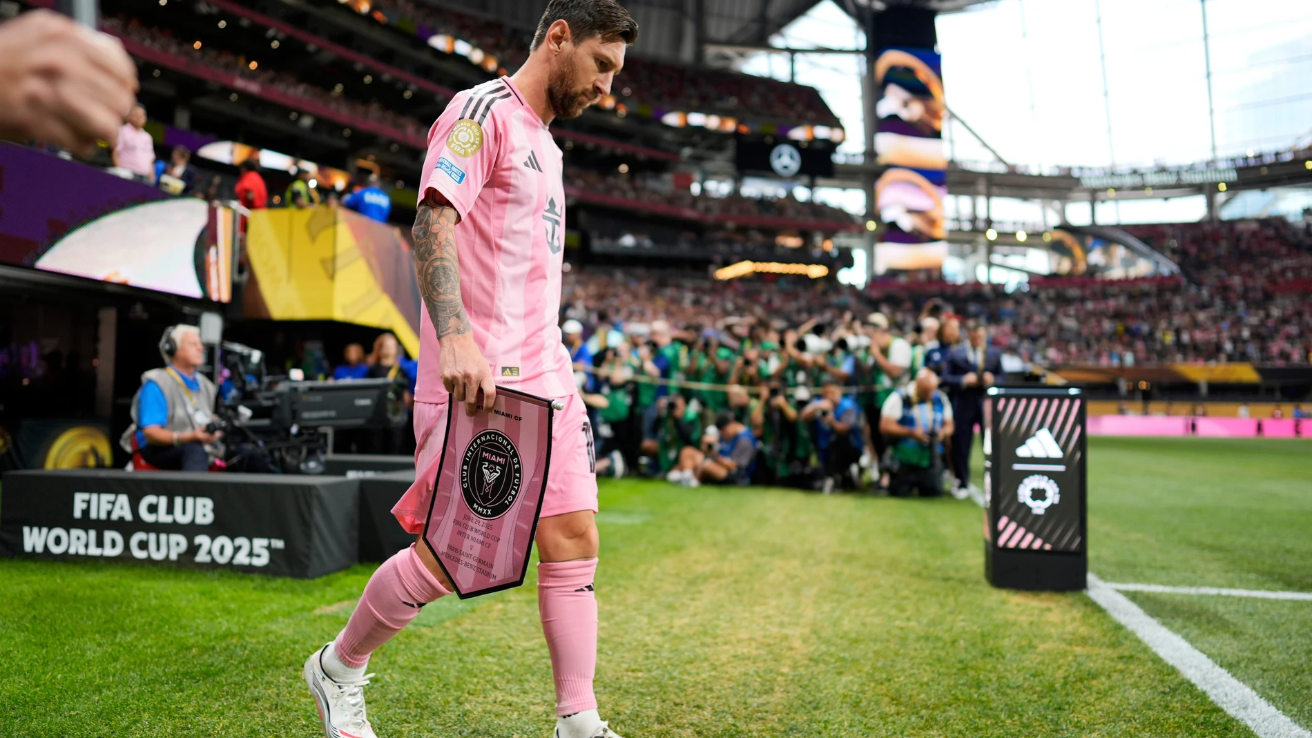 Inter Miami's Lionel Messi enters the field ahead of the Club World Cup round of 16 soccer match between PSG and Inter Miami in Atlanta, Sunday, June 29, 2025. (AP Photo/Mike Stewart)
