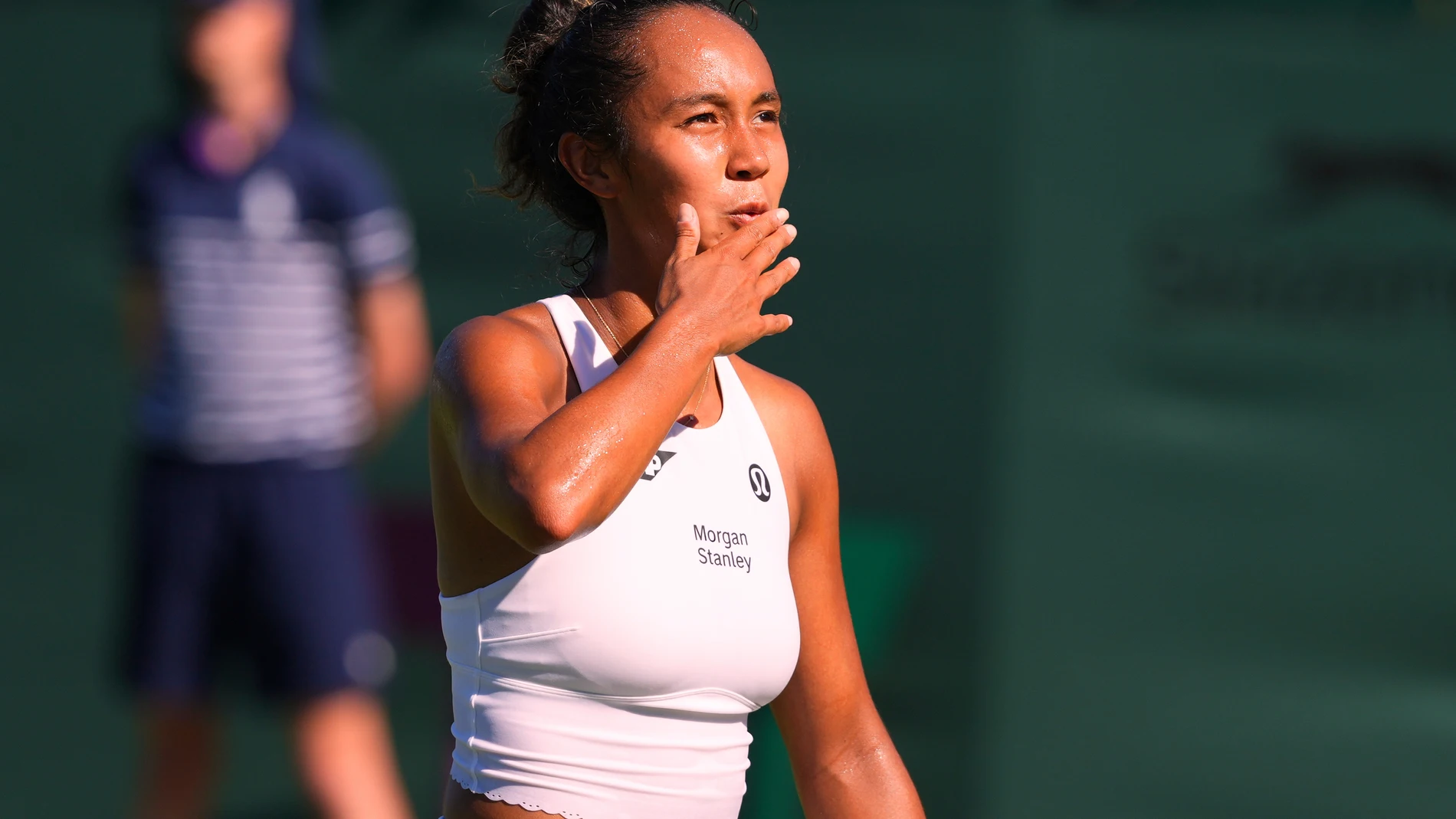Leylah Fernandez of Canada celebrates winning her first round women's single match against Hannah Klugman of Britain at the Wimbledon Tennis Championships in London, Monday, June 30, 2025. (AP Photo/Kirsty Wigglesworth)