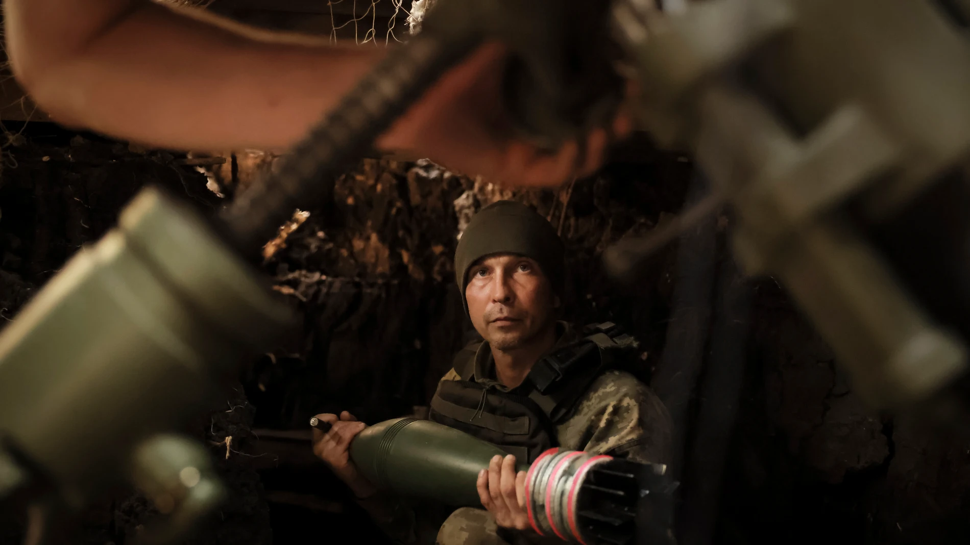 FILE - In this photo provided by Ukraine's 24th Mechanized Brigade press service, a soldier fires a 120 mm mortar toward Russian army positions near Chasiv Yar, Donetsk region, Ukraine, May 27, 2025. (Oleg Petrasiuk/Ukraine's 24th Mechanized Brigade via AP, File)