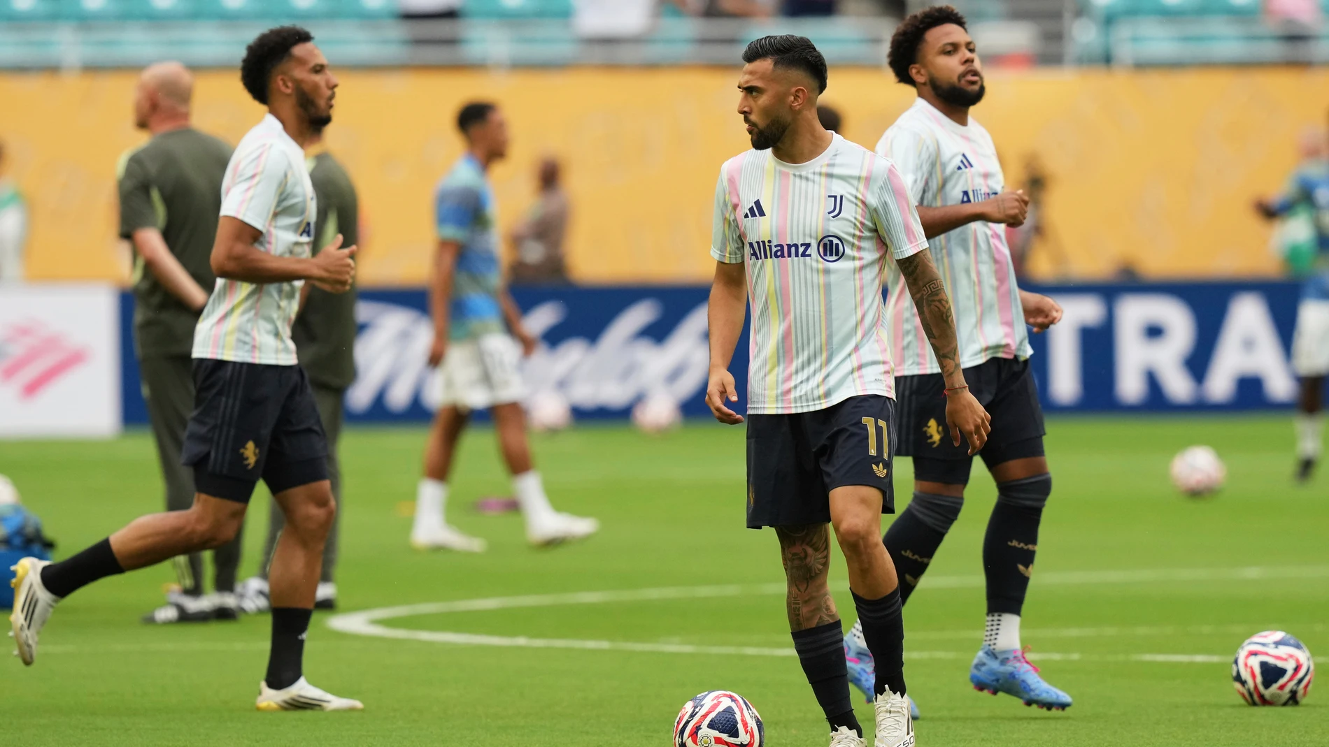 Juventus' Nicolas Gonzalez and his team mates warm up before the Club World Cup round of 16 soccer match between Real Madrid and Juventus in Miami Gardens, Fla., Tuesday, July 1, 2025. (AP Photo/Lynne Sladky)