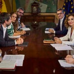 Reunion del PSOE (Maria Jesus Montero y Felix Bolaños) y Sumar (Ernest Urtasún) en la comisión sobre el pacto 