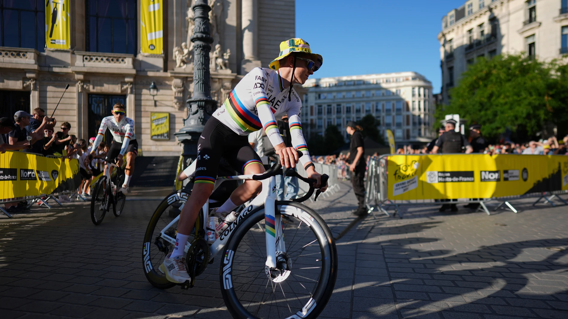 Slovenia's Tadej Pogacar rides during the team presentation two days ahead of the start of the Tour de France Cycling race in Lille, France, Thursday, July 3, 2025. (AP Photo/Thibault Camus)