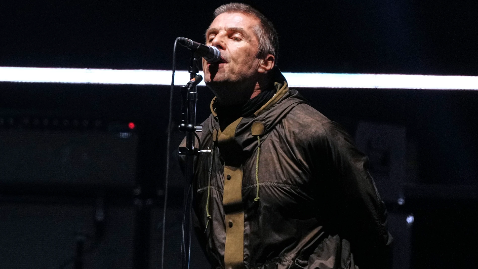 Liam Gallagher from the band Oasis performs during their reunion concert on Friday, July 4, 2025, in Cardiff. (Photo by Scott A Garfitt/Invision/AP)