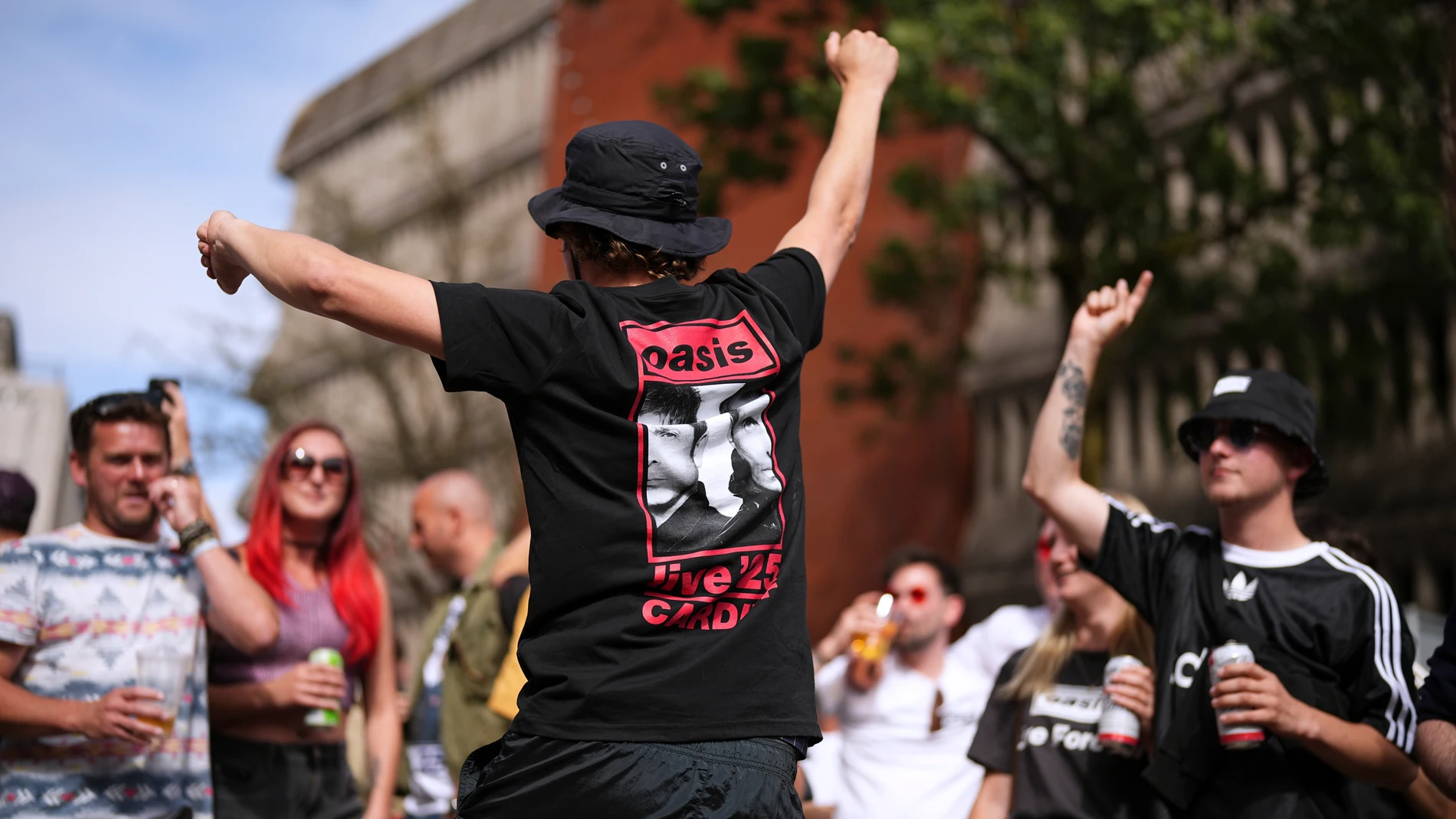Fans gather for the Oasis reunion concert on Friday, July 4, 2025, in Cardiff. (Photo by Scott A Garfitt/Invision/AP)