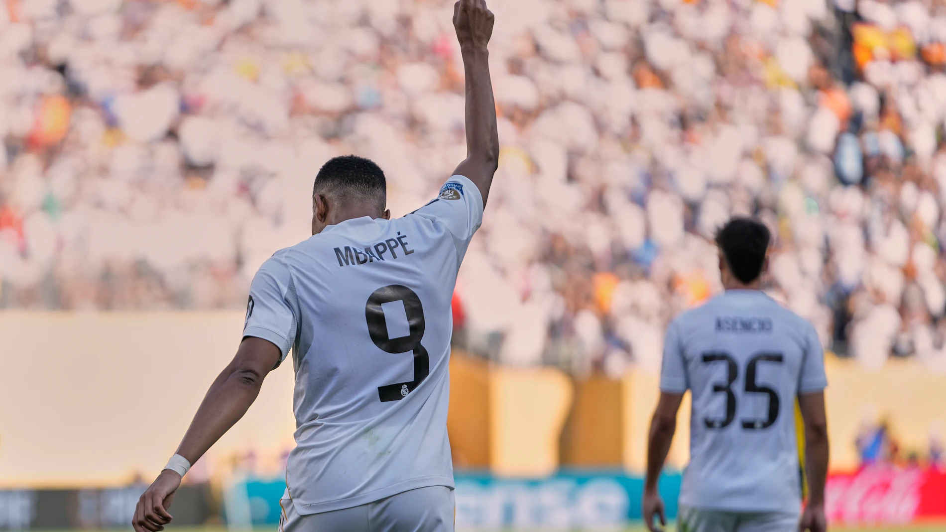 Real Madrid's Kylian Mbappe, left, reacts after scoring a goal against Borussia Dortmund in extra time of a Club World Cup quarterfinal soccer match, Saturday, July 5, 2025 in East Rutherford, N.J. (AP Photo/Frank Franklin II)