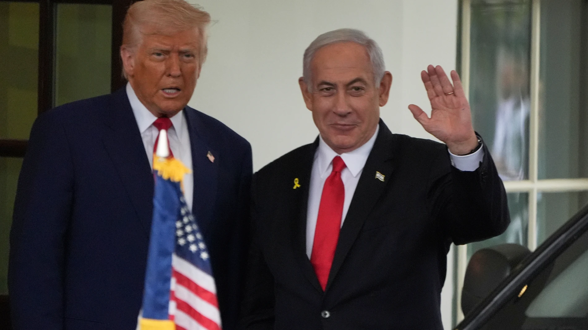FILE - Israel's Prime Minister Benjamin Netanyahu, right, is greeted by President Donald Trump as he arrives at the West Wing of the White House in Washington, April 7, 2025, in Washington. (AP Photo/Mark Schiefelbein, File)