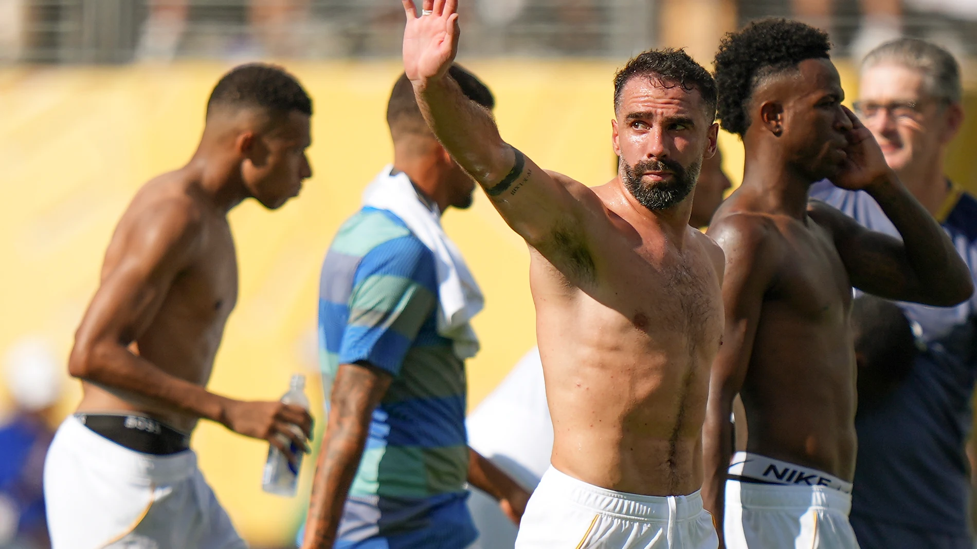 Real Madrid's Dani Carvajal waves to fans as he walks off the pitch after losing to Paris Saint-Germain in a Club World Cup semifinal soccer match in East Rutherford, N.J., Wednesday, July 9, 2025. (AP Photo/Frank Franklin II)
