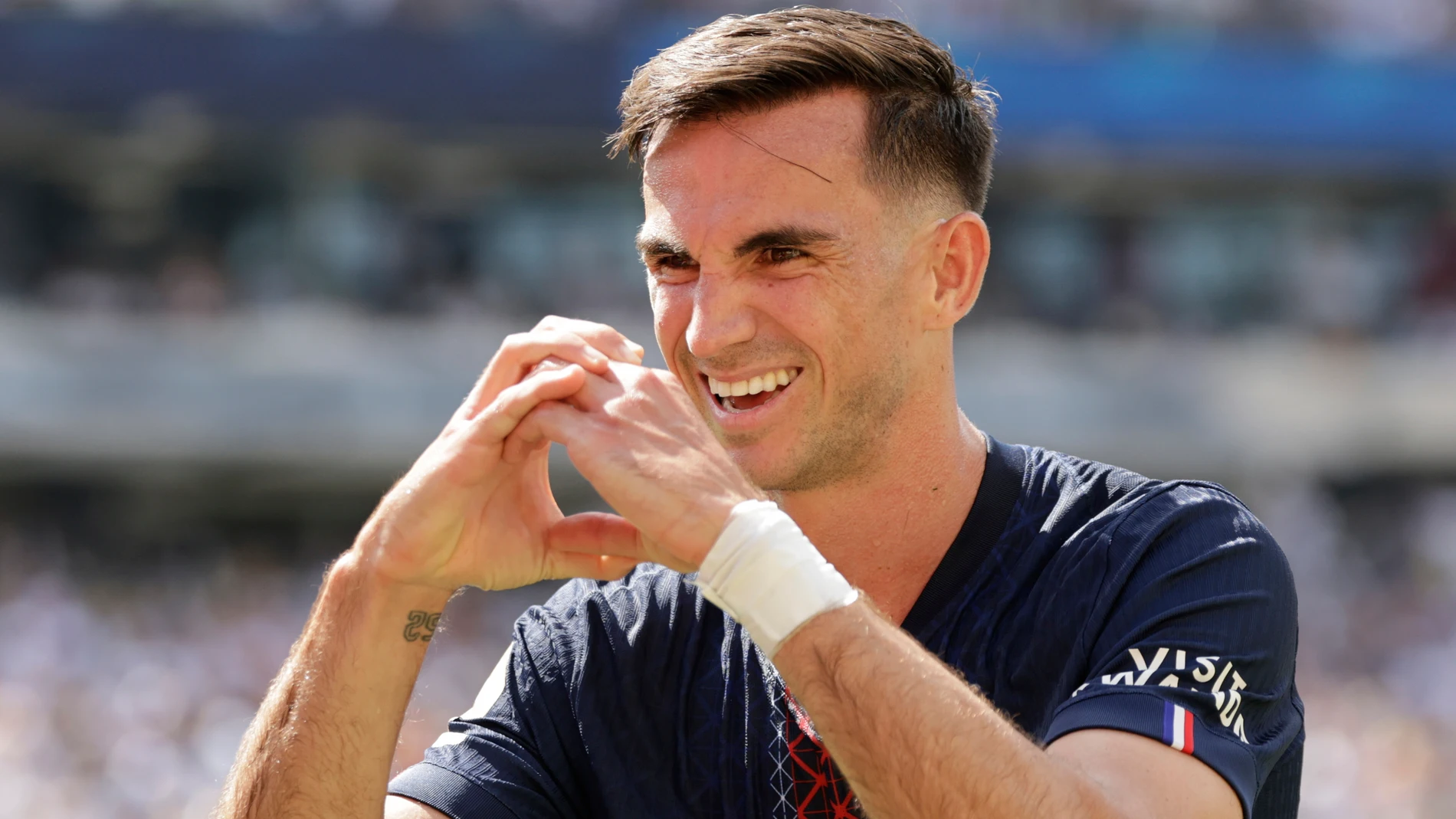 Paris Saint-Germain's Fabian Ruiz celebrates after scoring his side's third goal during the Club World Cup semifinal soccer match between PSG and Real Madrid in East Rutherford, N.J., Wednesday, July 9, 2025. (AP Photo/Adam Hunger)