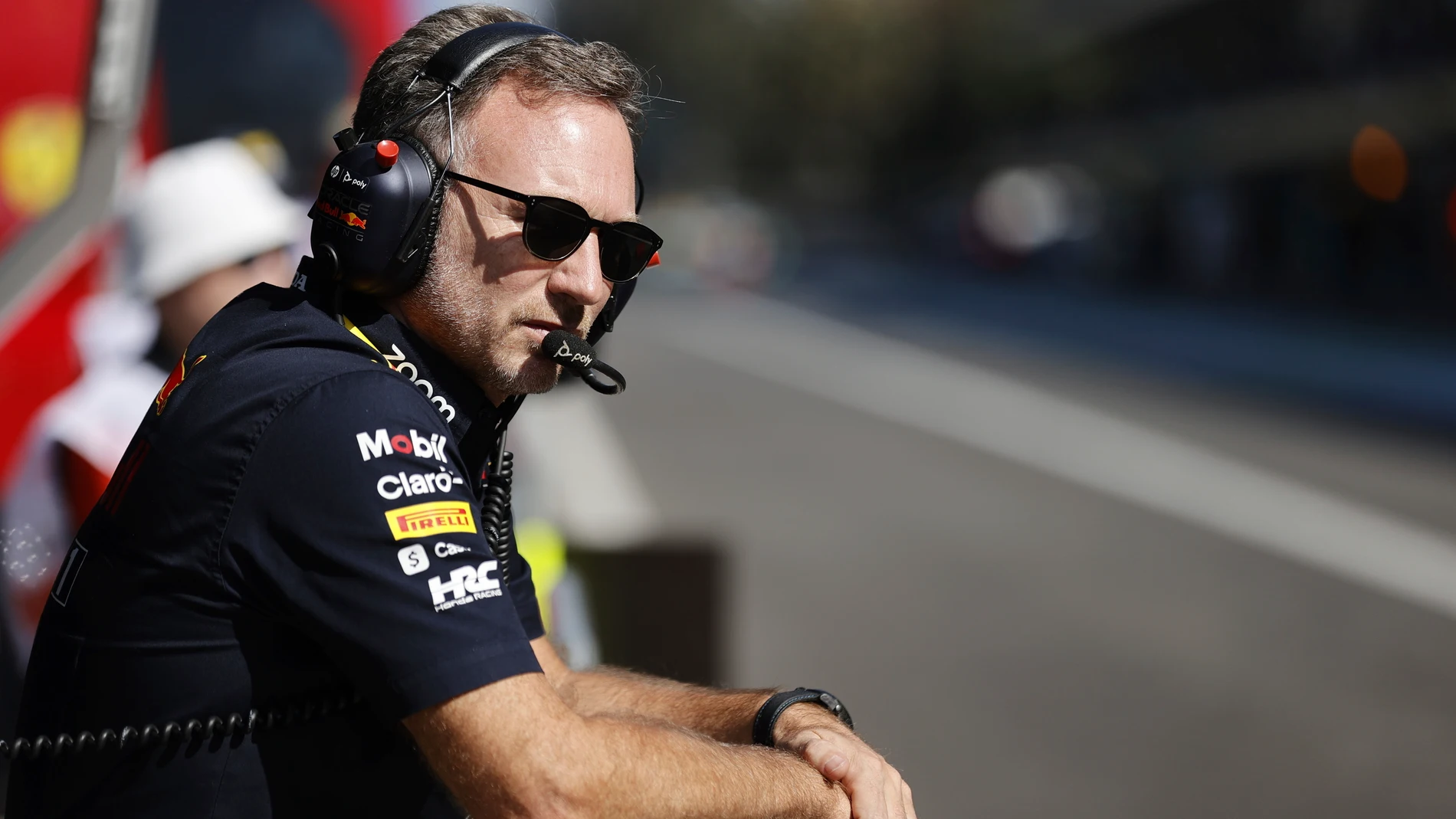 FILE - Team chief Christian Horner of Red Bull Racing looks at the track during the practice runs prior to the Formula One Mexico Grand Prix auto race at the Hermanos Rodriguez racetrack, in Mexico City, Oct. 28, 2023. (Andres Staph/Pool photo via AP File)