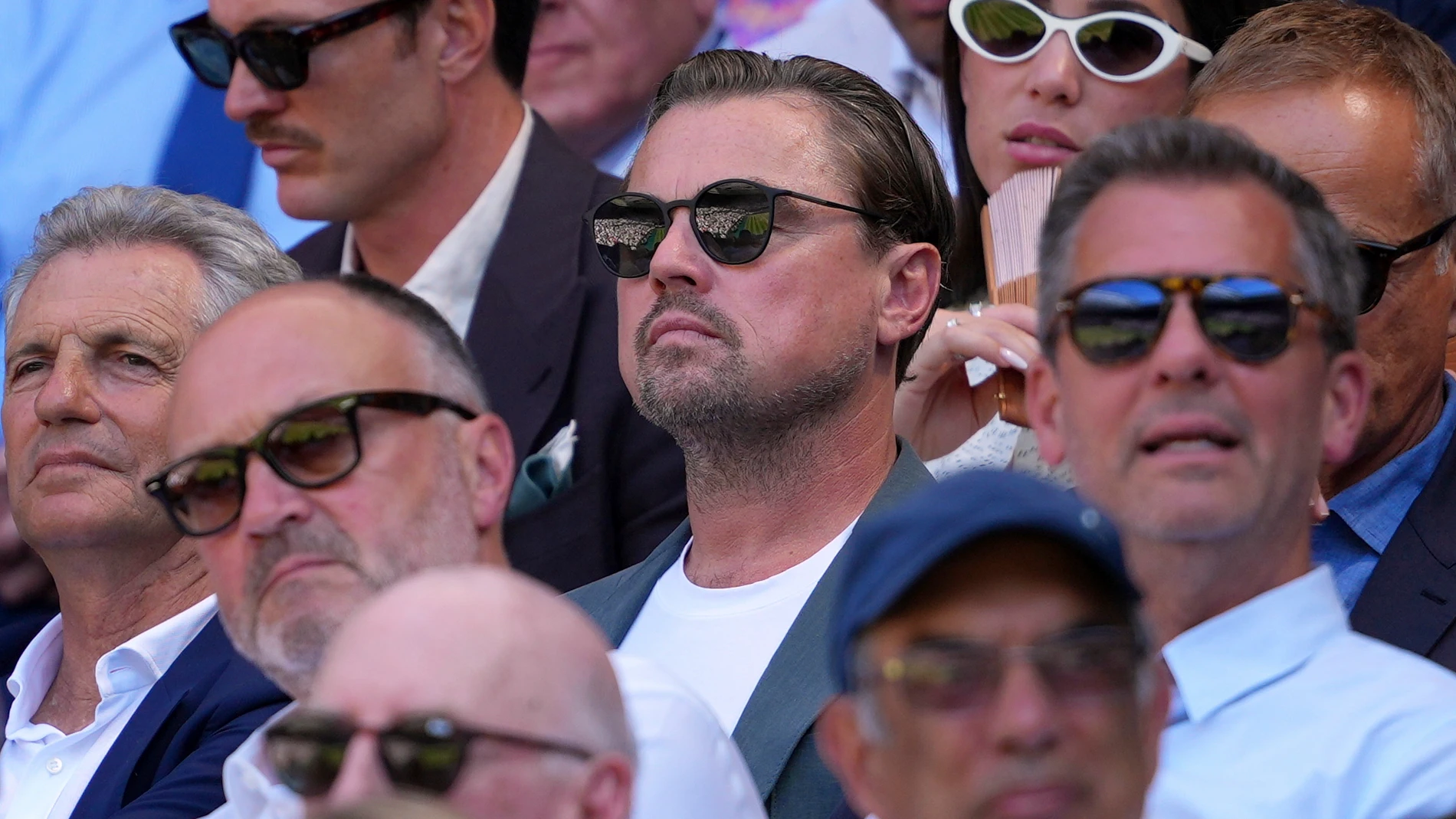 U.S. actor Leonardo DiCaprio watches Taylor Fritz of the U.S. and Carlos Alcaraz of Spain during the men's semifinal singles match at the Wimbledon Tennis Championships in London, Friday, July 11, 2025.(AP Photo/Joanna Chan)