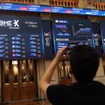 Economía/Bolsa.- El Ibex 35 busca de nuevo recuperar los 14.000 puntos tras subir un 0,63% en la media sesión