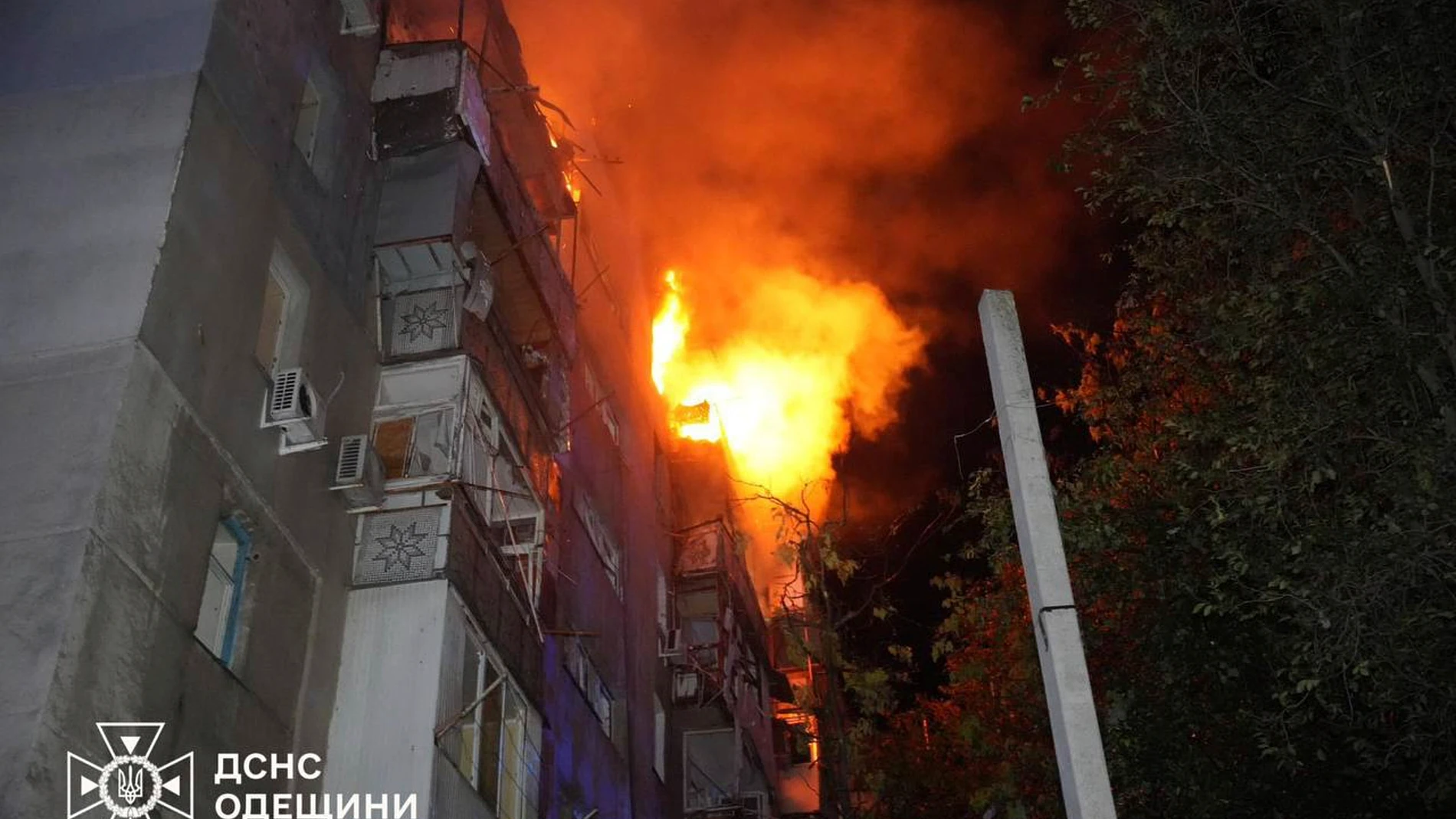 In this photo provided by the Ukrainian Emergency Service, a residential building burns following a Russian air attack in Odesa, Ukraine, Saturday, July 19, 2025. (Ukrainian Emergency Service via AP)