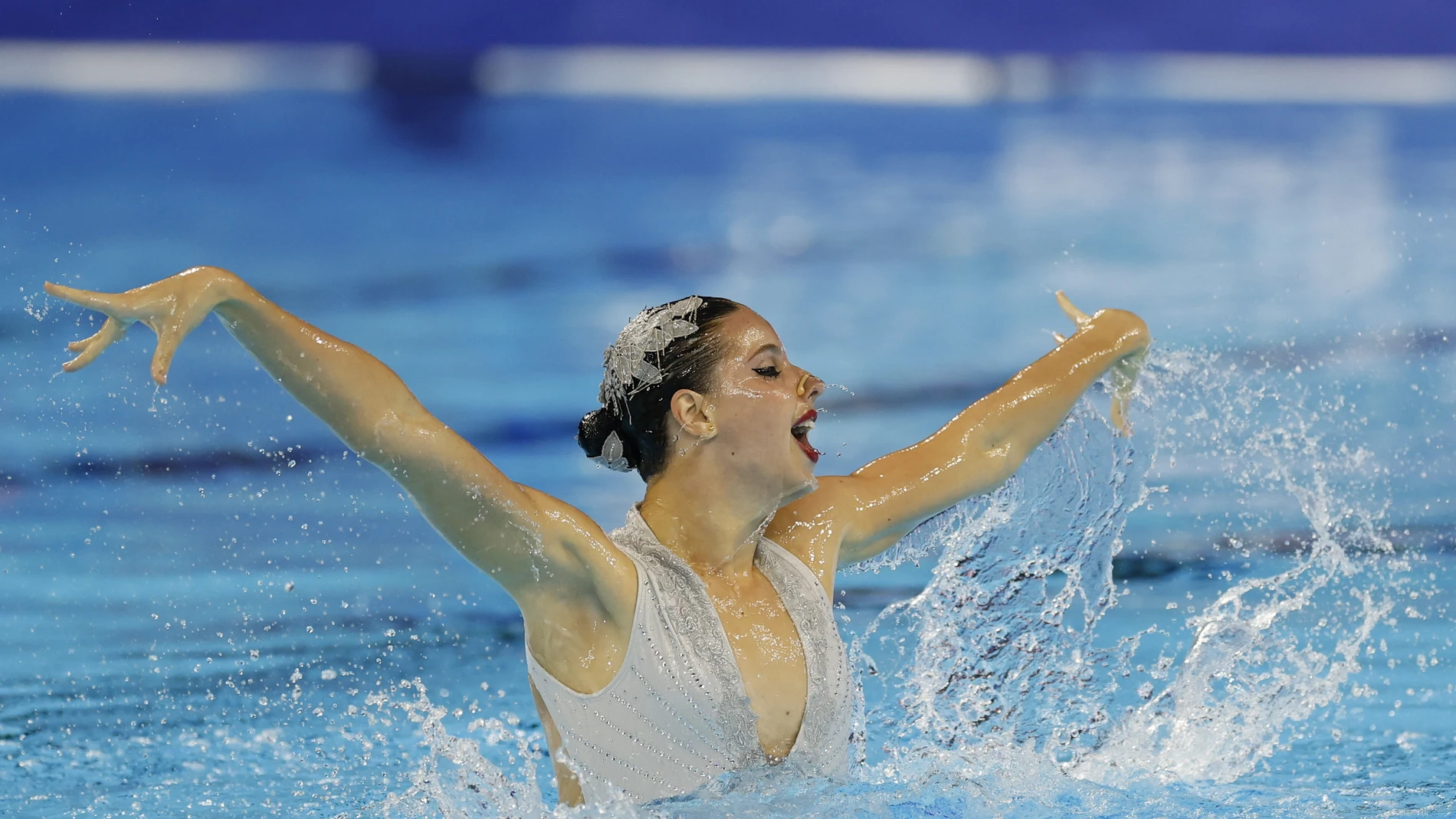 SINGAPORE (Singapore), 20/07/2025.- Iris Tio Casas of Spain competes in the Women’s Solo Free preliminaries of artistic swimming at the World Aquatics Championships Singapore 2025 in Singapore, 20 July 2025. (España, Singapur) EFE/EPA/RUNGROJ YONGRIT