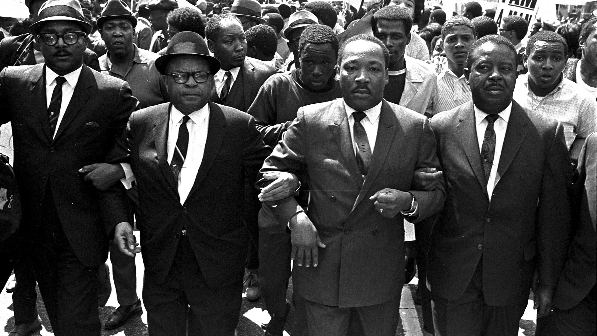 FILE - The Rev. Ralph Abernathy, right, and Bishop Julian Smith, left, flank Dr. Martin Luther King, Jr., during a civil rights march in Memphis, Tenn., March 28, 1968. (AP Photo/Jack Thornell, File)