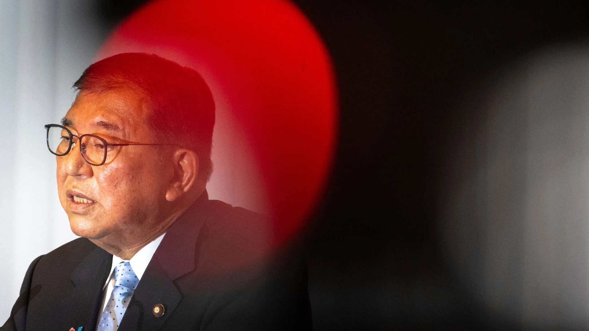 Japan's Prime Minister Shigeru Ishiba attends a press conference at the headquarters of the Liberal Democratic Party (LDP) in Tokyo Monday, July 21, 2025 after the prime minister's ruling coalition failed to secure a majority in the upper house in a parliamentary election. (Philip Fong/Pool Photo via AP)