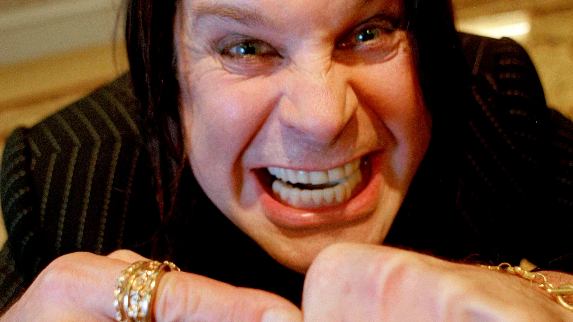 FILE - Heavy metal rock star Ozzy Osbourne poses at the Peninsula Hotel in New York, July 27, 2000. (AP Photo/Jeff Geissler, file)