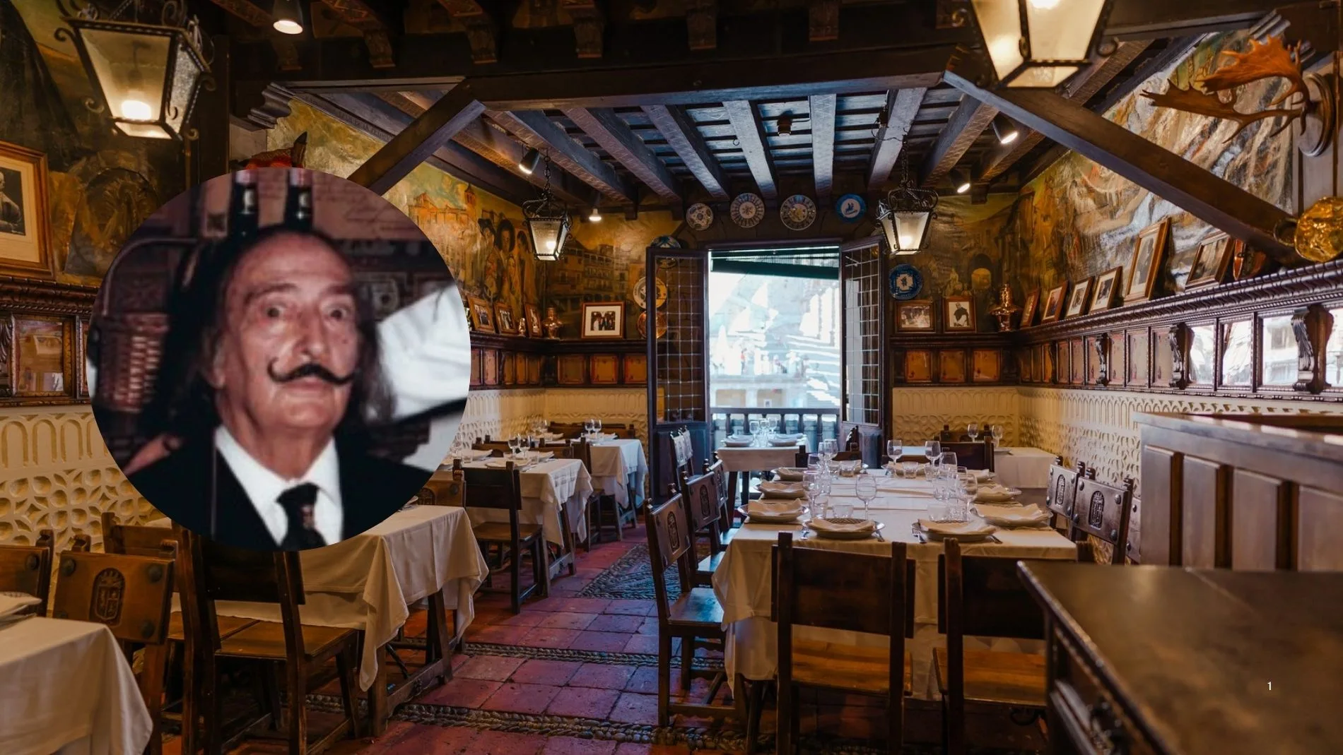 Imagen del comedor del Mesón Cándido con una foto de Salvador Dalí una d elas veces que comió en este templo gastronómico de Segovia