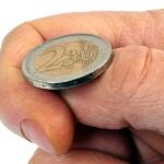 Lanzar una moneda a cara o cruz