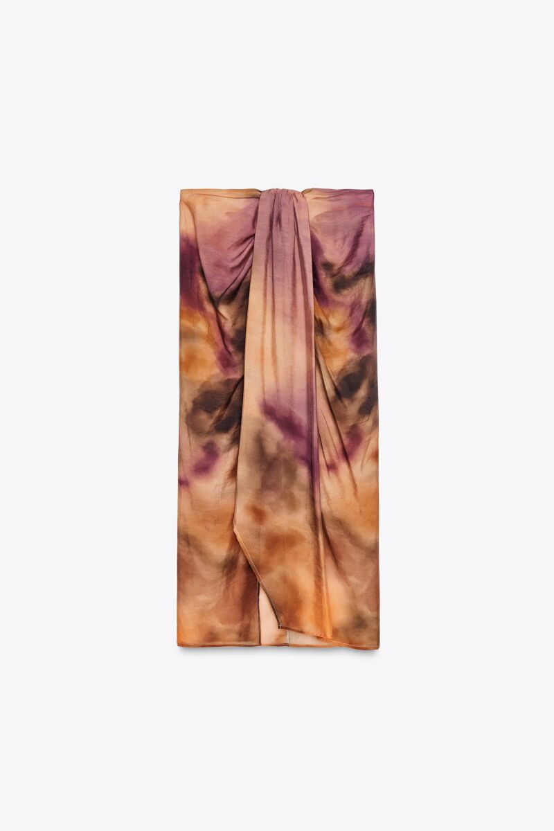 Pareo estampado nudo.