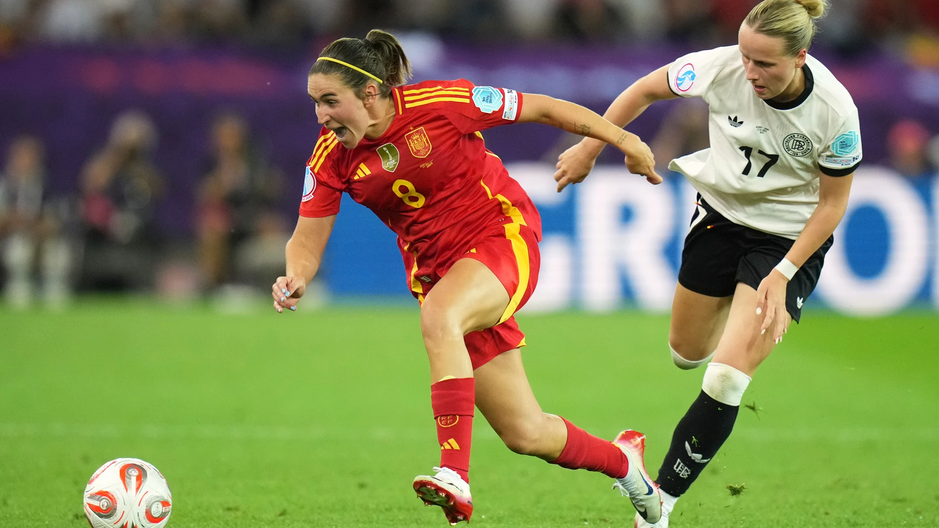 Spain's Mariona Caldentey vies for the ball with Germany's Franziska Kett, right, during the Women's Euro 2025 semifinals soccer match between Germany and Spain at Stadion Letzigrund in Zurich, Switzerland, Wednesday, July 23, 2025. (AP Photo/Alessandra Tarantino)