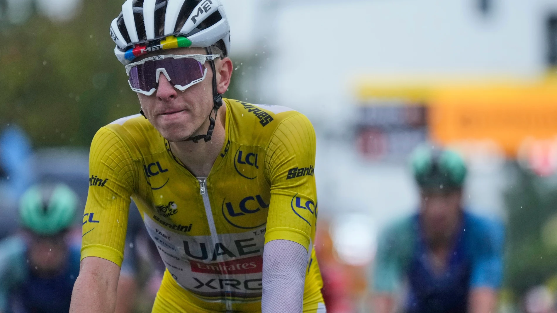 Slovenia's Tadej Pogacar crosses the finish line to complete the seventeenth stage of the Tour de France cycling race over 160.4 kilometers (99.7 miles) with start in Bollene and finish in Valence, France, Wednesday, July 23, 2025. (AP Photo/Mosa'ab Elshamy)
