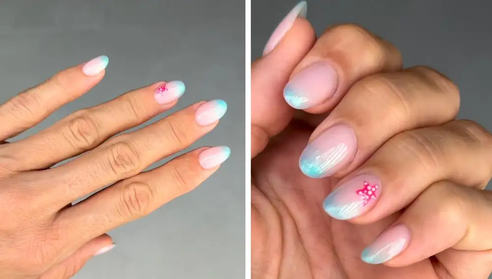 Manicura con degradado azul y estrella fucsia.