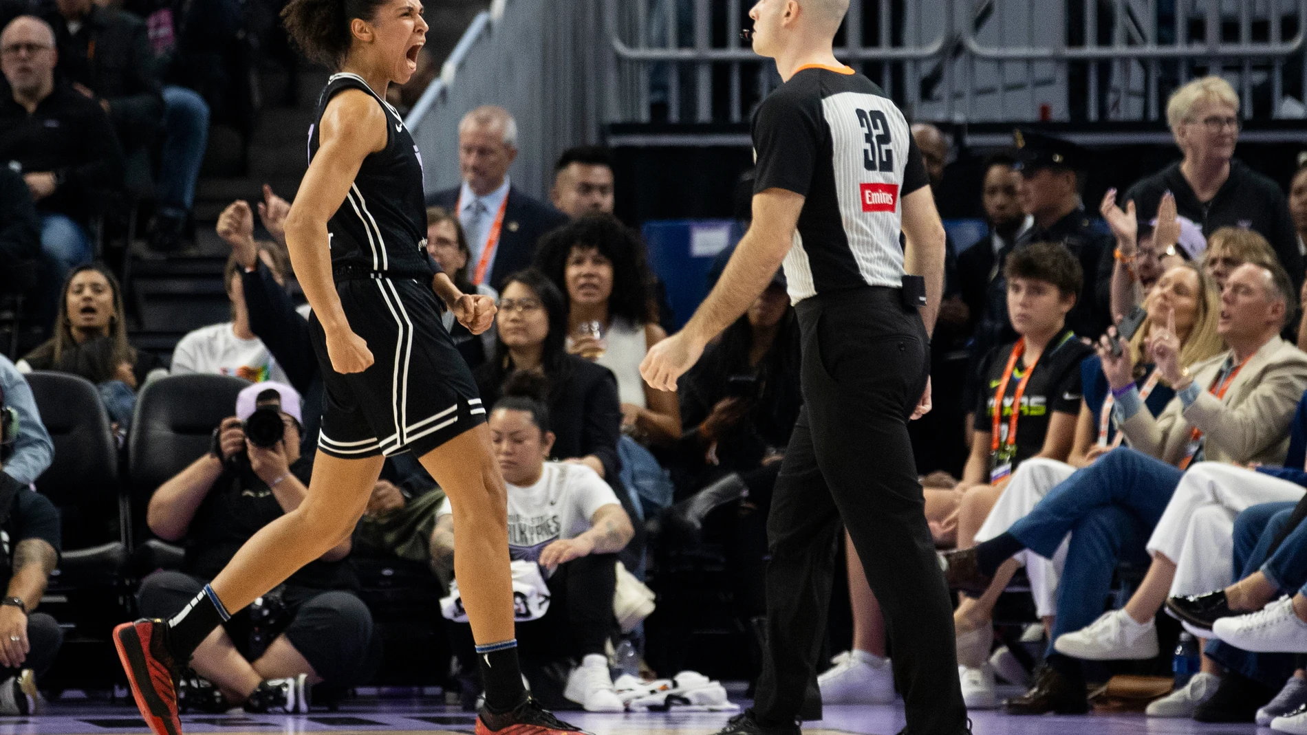 Golden State Valkyries forward Janelle Salaun (13) reacts after scoring a basket during the second quarter of her WNBA basketball game against the Dallas Wings in San Francisco, Friday, July 25, 2025. (Stephen Lam/San Francisco Chronicle via AP)