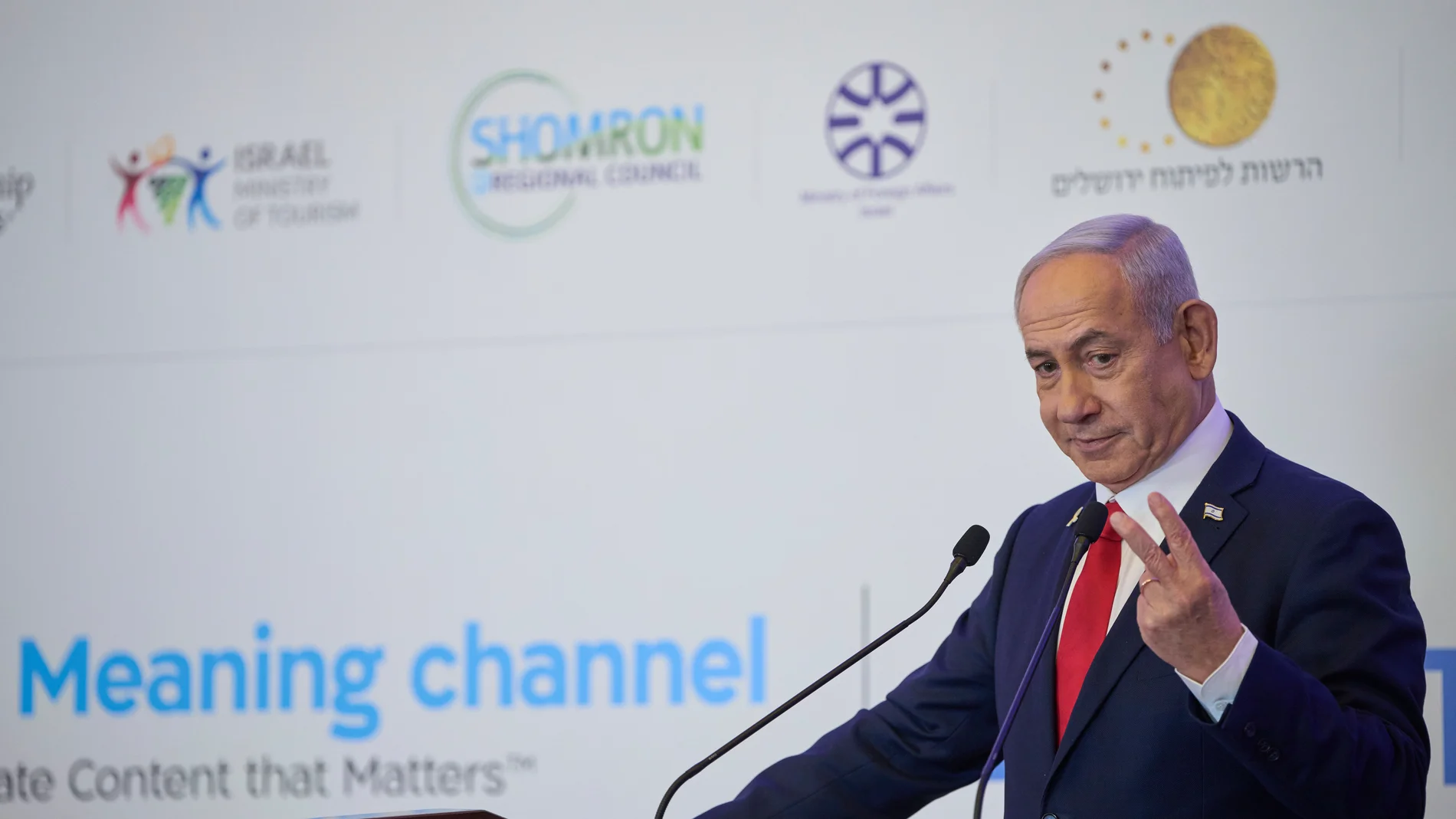 Israeli Prime Minister Benjamin Netanyahu speaks to the audience at a conference in Jerusalem, Sunday, July 27, 2025. (AP Photo/Ohad Zwigenberg)