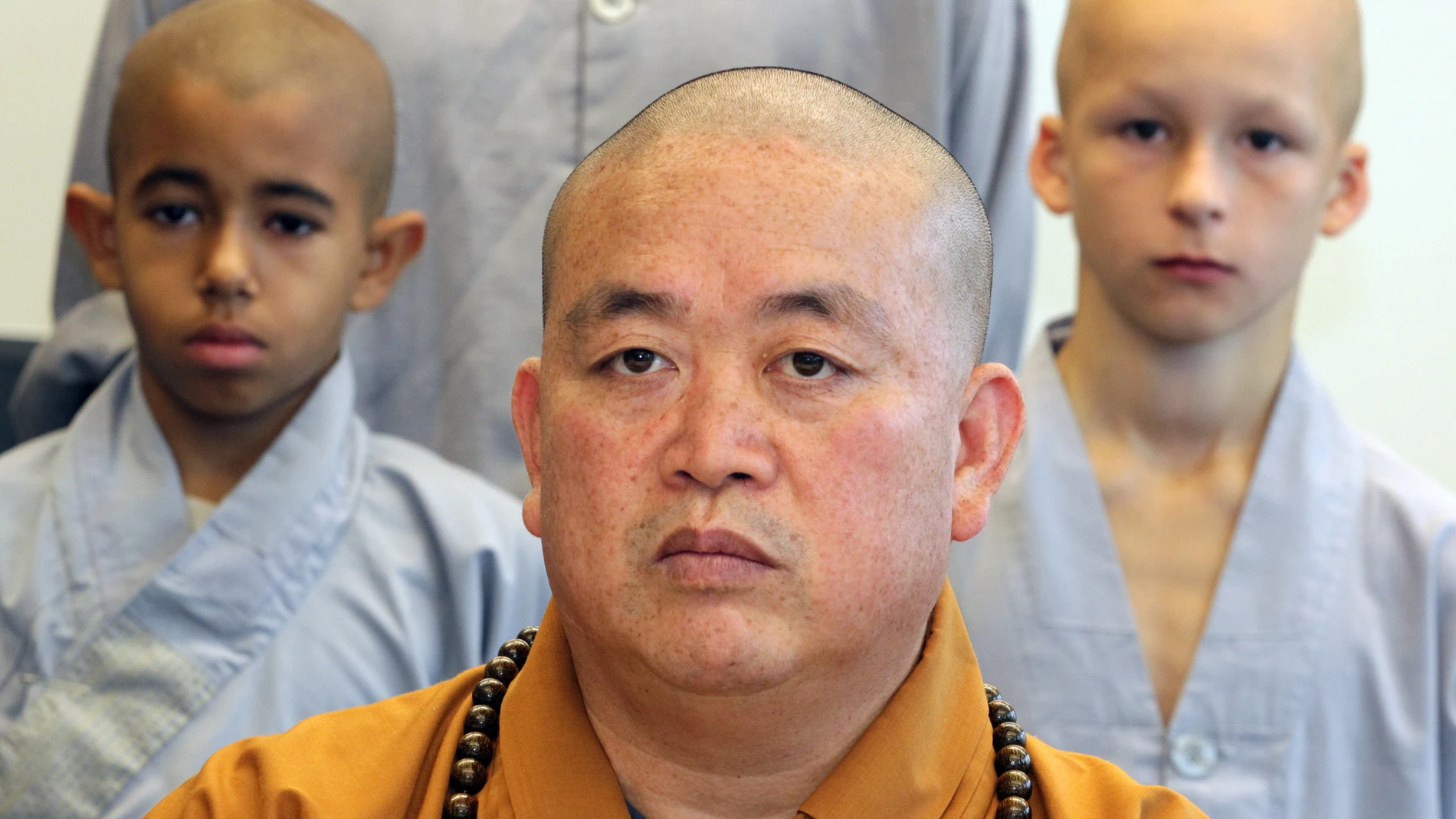BERLIN (Germany), 28/07/2025.- (FILE) - Shi Yongxin (front), abbot of the Chinese Shaolin temple in Henan, speaks at a press conference held at the Chinese Culture Centre in Berlin, Germany, 07 September 2012 (reissued 28 July 2025). The head of the renowned Shaolin Temple is under investigation for alleged criminal offences, including embezzlement of project funds and temple assets, according to a statement released by the temple on 27 July. (Alemania) EFE/EPA/OLE SPATA GERMANY OUT