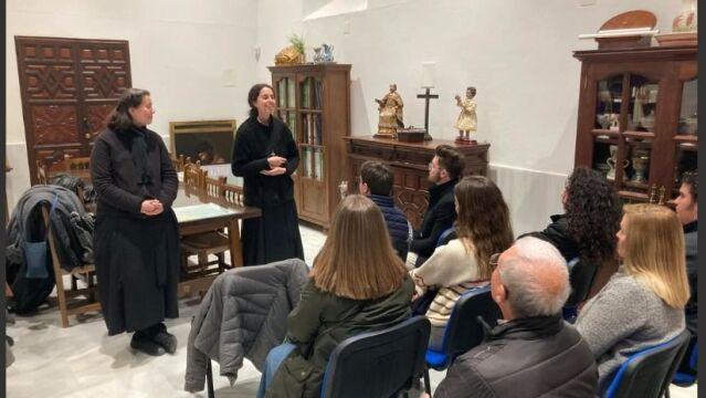 Las HAM durante una charla en una parroquia