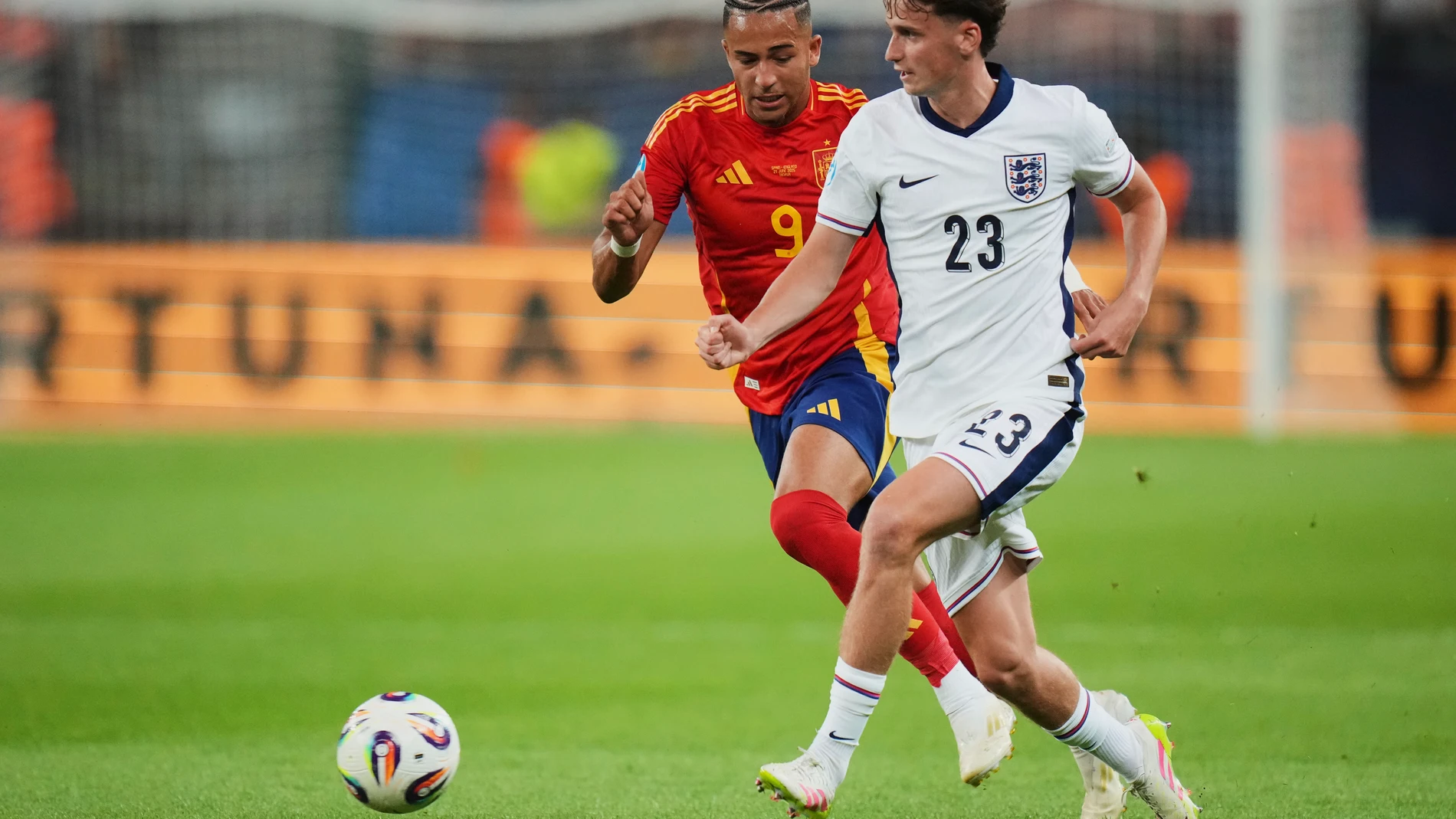 FILE - England's Tyler Morton, front, duels for the ball with Spain's Mateo Joseph during a quarter final soccer match between Spain and England at the European U-21 Championship at the Anton Malatinsky Stadium, in Trnava, Slovakia, June 21, 2025. (AP Photo/Petr David Josek, File)