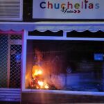 Escaparate de un local de Cuenca incendiado