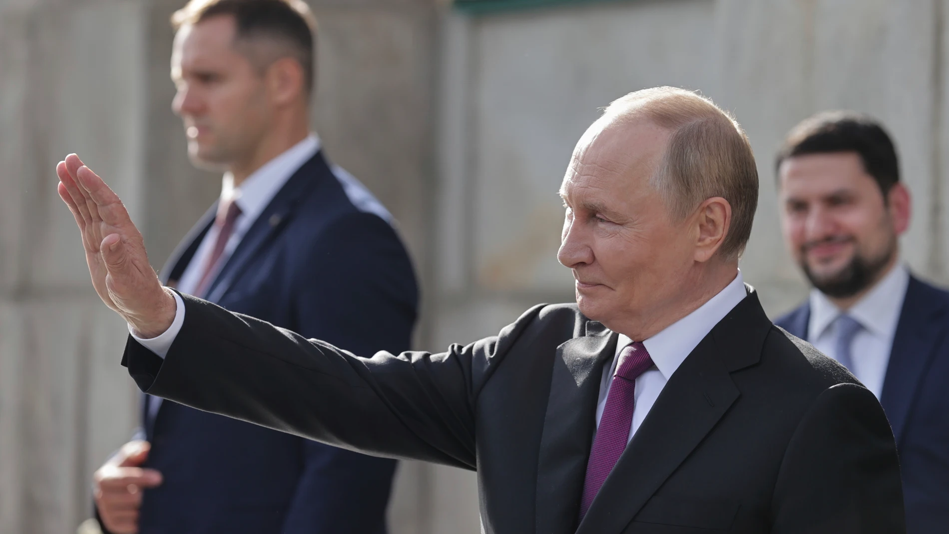 Russian President Vladimir Putin, front, bids farewell to United Arab Emirates President Sheikh Mohammed bin Zayed Al Nahyan following their meeting at the Kremlin in Moscow, Russia, Thursday, Aug. 7, 2025. (Mikhail Sinitsyn, Sputnik, Kremlin Pool Photo via AP)